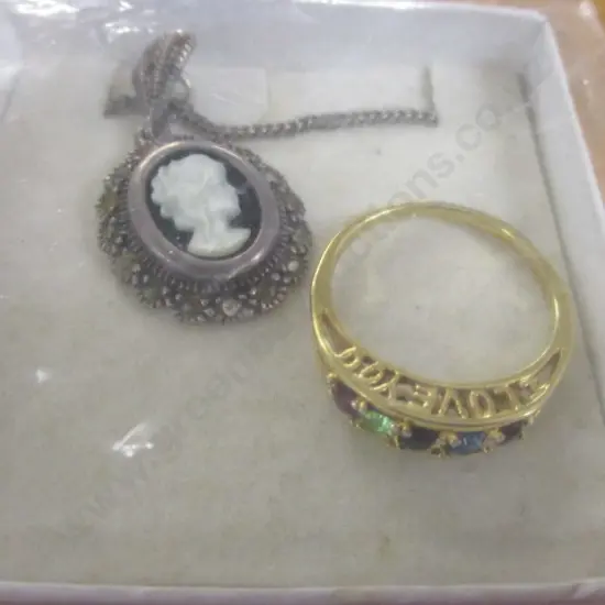 Cocktail Ring and Cameo Necklace