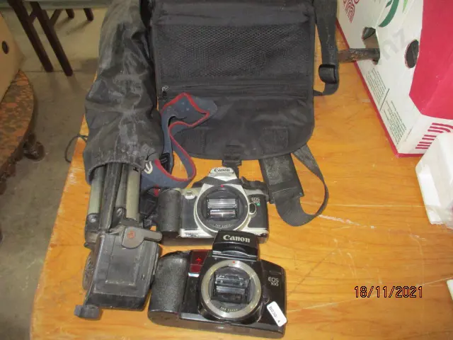 Camera Bodies and Tripod Image 1++
