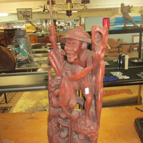 Carved Fishers
