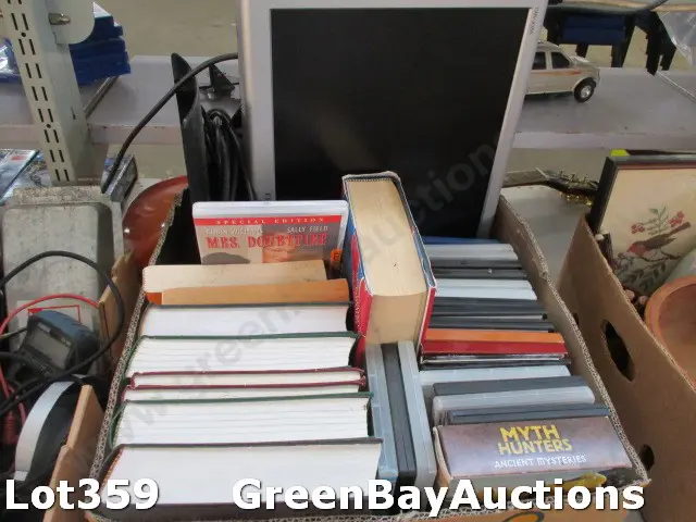 Dvds Books and Monitor Image 1++